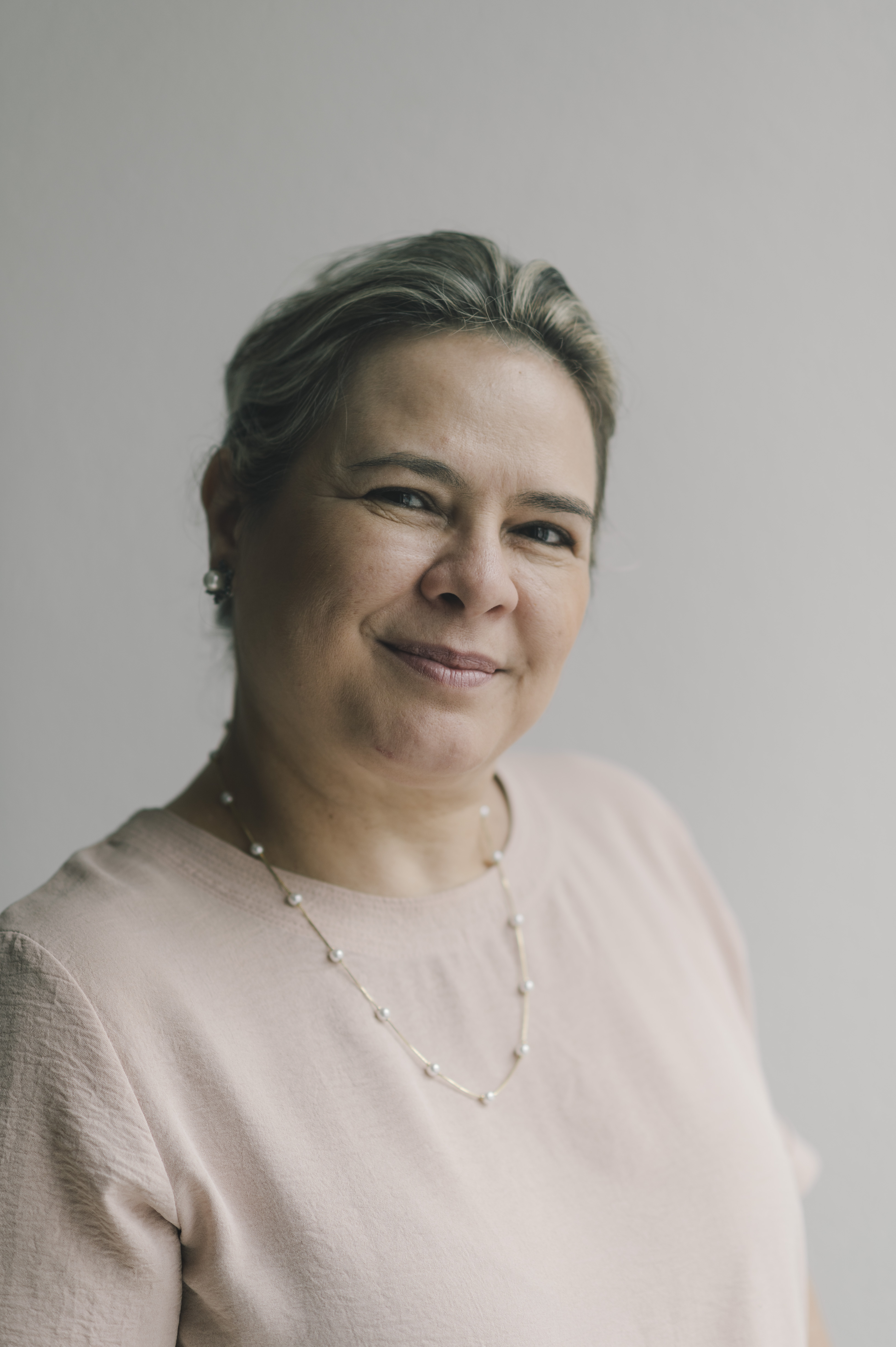 Adriana Ângela Roveda em seu ambiente profissional